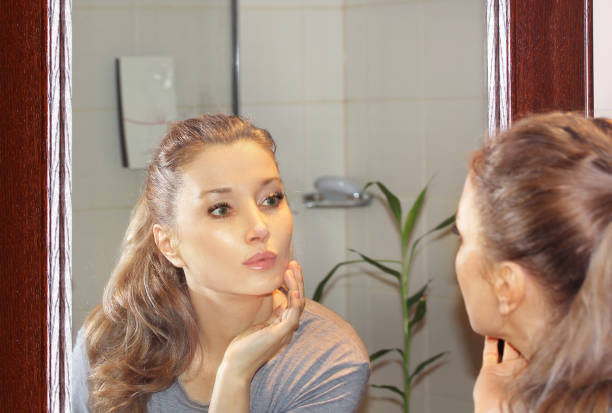 istock Applying the cream..Magic anti-aging cream. 1345669307