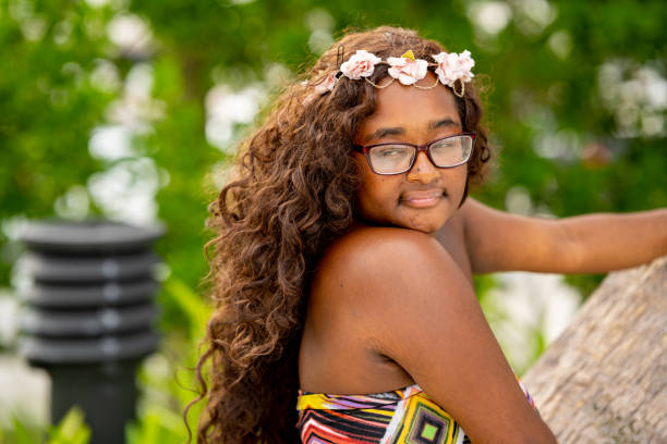 istock Young woman in a park setting scene 1345670339