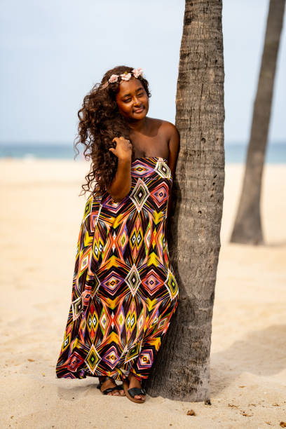 istock Natural young woman posing in a outdoors beach scene 1345670814