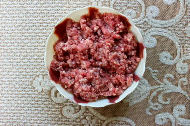 Raw minced mutton in a bowl
