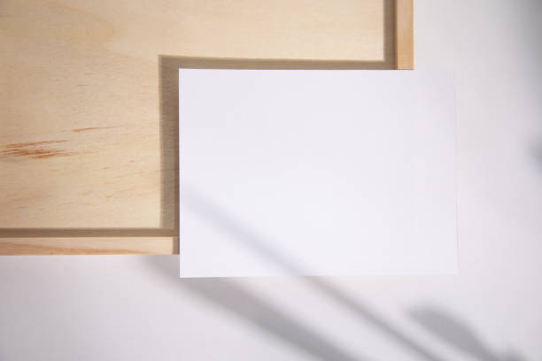 istock mockup paper card on wood 1345674599