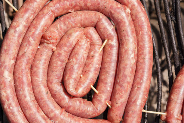 Grilled sausages and meat, barbecue grilled on coals.