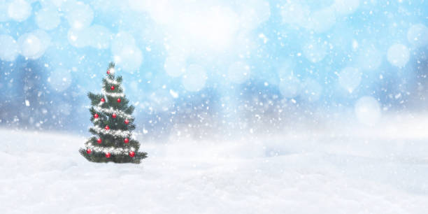istock Christmas tree with red Christmas balls in the snow 1345680206