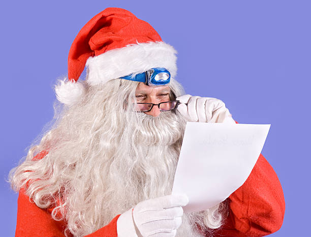 istock Santa Claus reads the letter 134568207