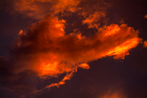 Beautiful sunset. Orange clouds in the sky. Horizon. Twilight