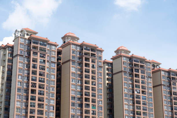 istock Modern residential buildings under blue sky and white clouds 1345685110