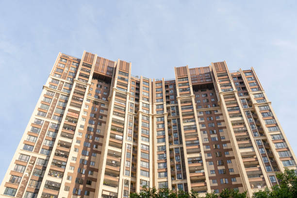 istock Modern residential buildings under blue sky and white clouds 1345685222