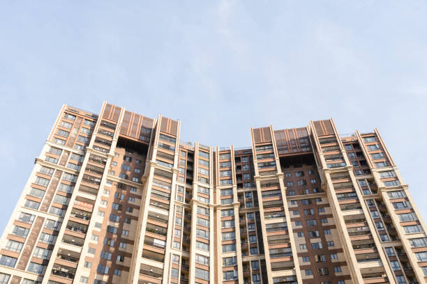 istock Modern residential buildings under blue sky and white clouds 1345685223