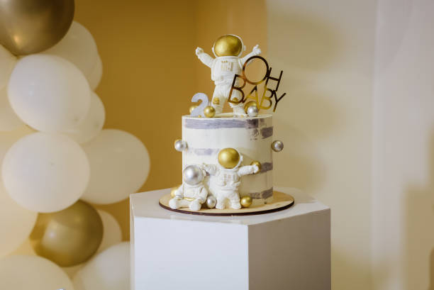 Spacemen decorated themed birthday cake.