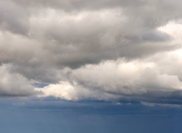 istock Dark and gray clouds formations in the sky. Only sky image, no land. 1345686232