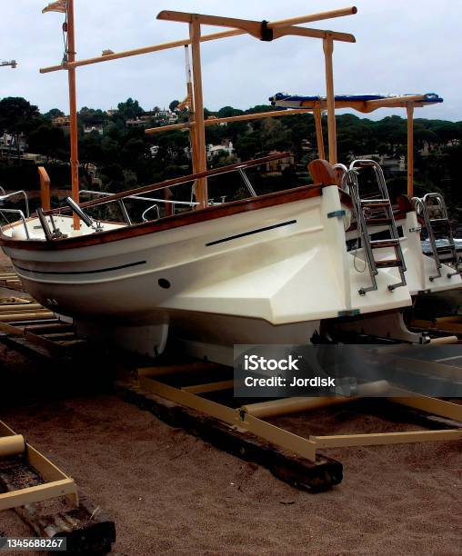 Boats On The Beach Stock Photo - Download Image Now - Anchored, Beach, Coastline