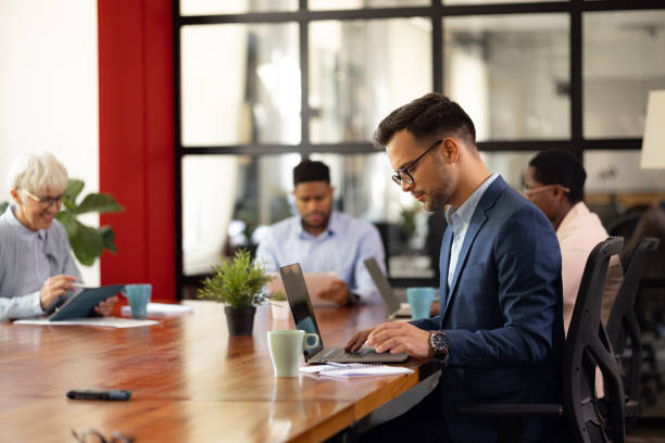 istock Young Caucasian businessman working in the office 1345692166