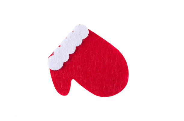 Christmas tree decoration Christmas red mitten on a white background. Christmas tree decoration Christmas red mitten on a white background. felt heart shape small red stock pictures, royalty-free photos & images