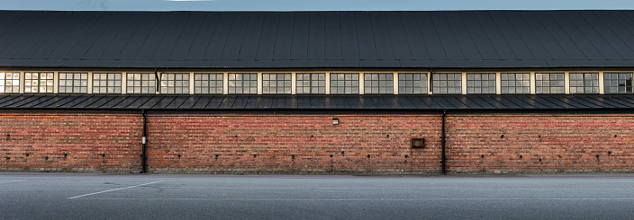 Gothenburg, Sweden - May 17 2021: Exterior of old stables at Kvibergs kaserner.