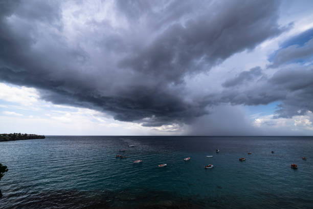 istock Thundershower scenery with flying clouds over the turquoise sea around Curacao, the Caribbean 1345708288