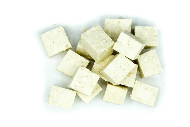 istock Tofu isolated on white background top view 1345713182