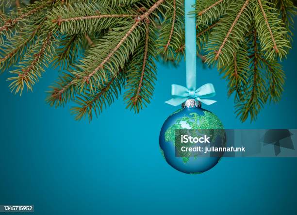 Globe Christmas Ornament Hanging Stock Photo - Download Image Now - Christmas, Globe - Navigational Equipment, Christmas Ornament