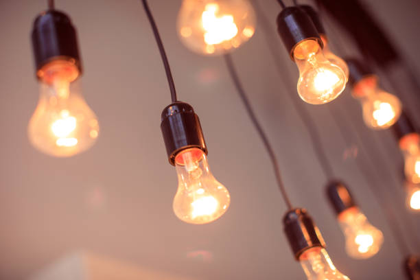 istock vintage light bulbs on black wires interior decoration 1345719912