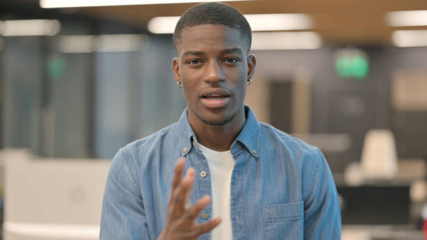 Vlogging Young African Man Talking During Video Chat