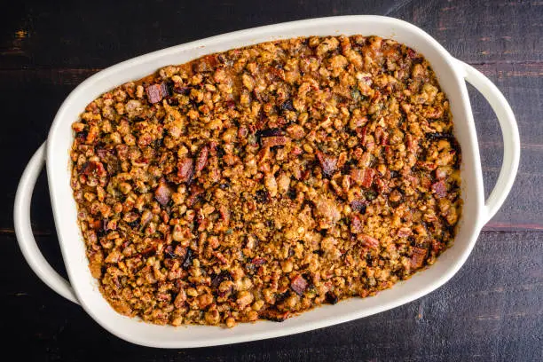 Sweet potato casserole with pecan topping in a baking dish