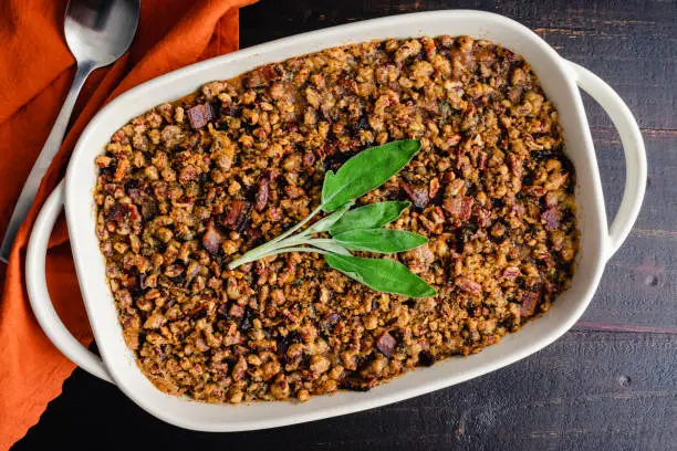 Sweet potato casserole with pecan topping in a baking dish