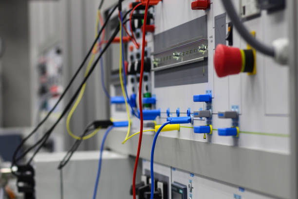 istock Electrical equipment and appliances, front panel with wires, connectors and switches. 1345733119