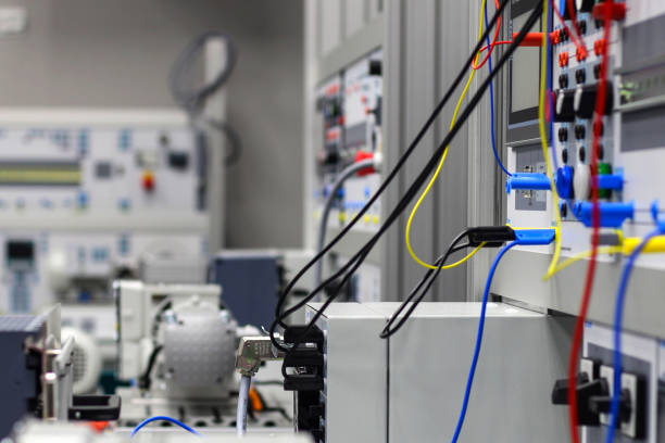 istock Electrical equipment and appliances, front panel with wires, connectors and switches. 1345733121