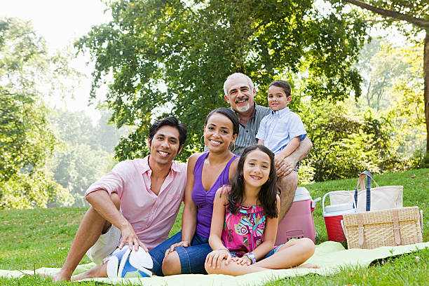 Three generation family at picnic in park, portrait New York City,USA, happy filipino family stock pictures, royalty-free photos & images