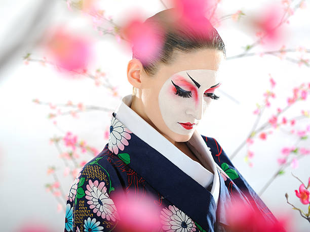 Artistic portrait of japan geisha woman with creative make-up stock photo