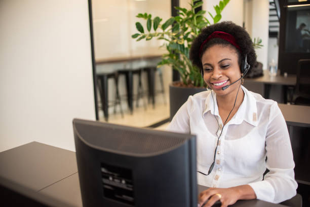 istock Woman working in a call center. 1345749548