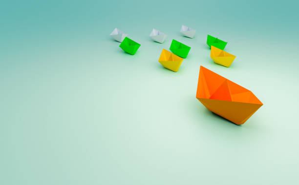 istock paper boat take a leader and team work 1345756860