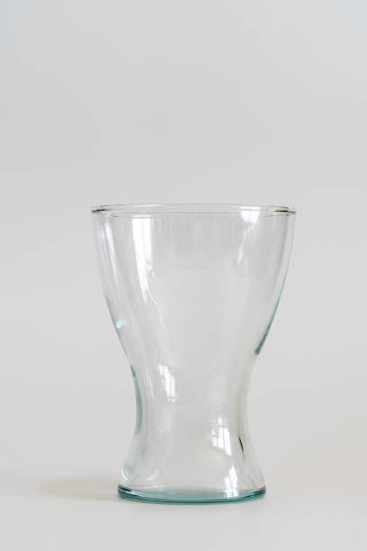 Transparent glass vase isolated on white background