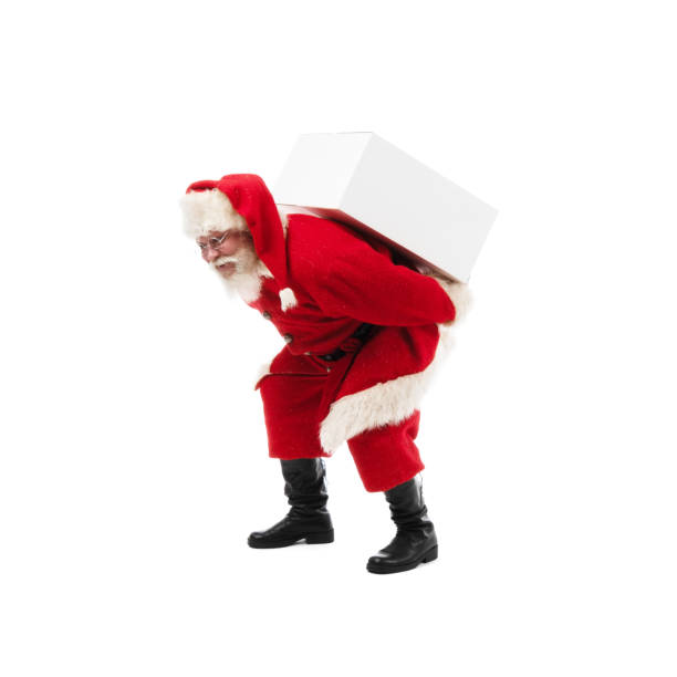 istock Santa Claus carrying gift box on white 1345765633