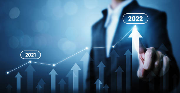 istock Businessman pointing arrow graph corporate future growth plan. Business development to success and growing growth year 2021 to 2022 concept 1345772676