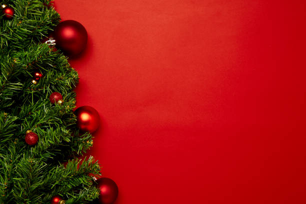 istock Merry Christmas composition on red background 1345776333