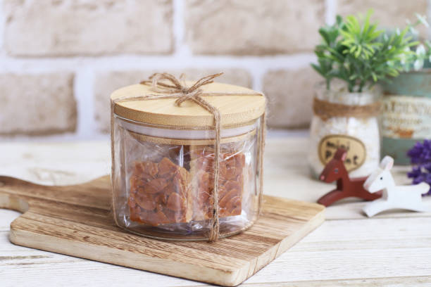 istock Almond Florentines gift package in a fashionable transparent container 1345780791