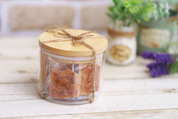 istock Almond Florentines gift package in a fashionable transparent container 1345780797