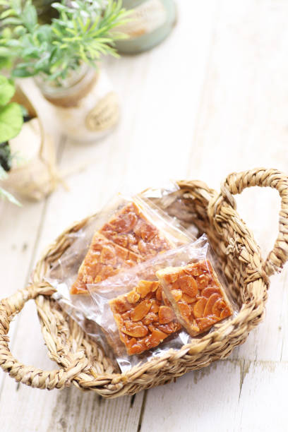 istock Almond florentines in a basket, sweets 1345780813