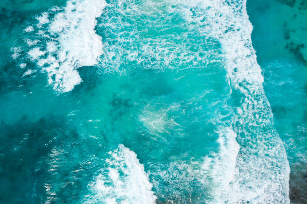 istock Blue ocean texture with waves and foam. La Digue Island, Seychelles. 1345781702