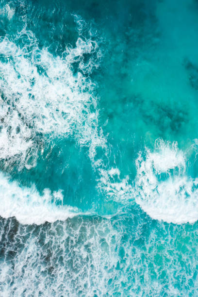 istock Blue ocean texture with waves and foam. La Digue Island, Seychelles. 1345781703