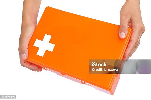 手を持つ若い女性用救急キット - オレンジ色のストックフォトや画像を多数ご用意 - オレンジ色, 応急処置, 1人