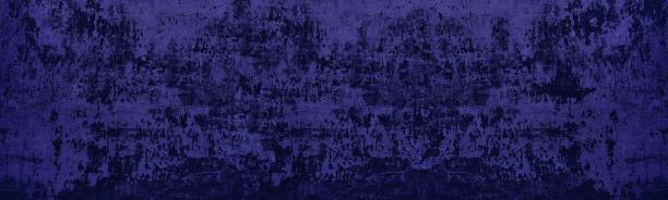 istock Navy blue crumpled paper wide texture. Indigo colored wrinkled paper sheet widescreen backdrop. Dark abstract retro background 1345786328