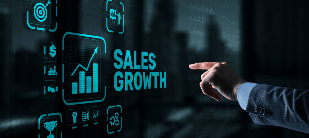 Sales Growth Man clicks inscription on virtual 3D screen stock photo