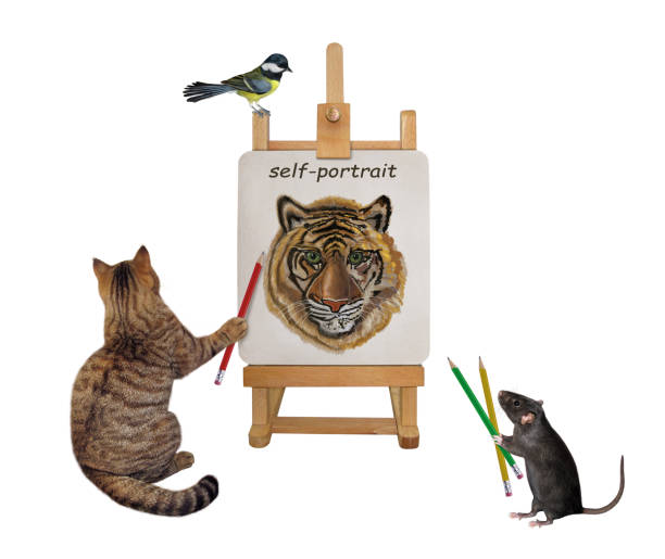 istock Cat artist paints his self-portrait 4 1345798262