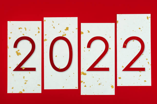 Red 2022 number on glitter gold paper