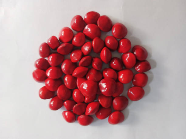 istock Saga Seed Acacia beans red in colour 1345800546