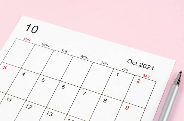 istock October 2021 calendar sheet with pen 1345801215