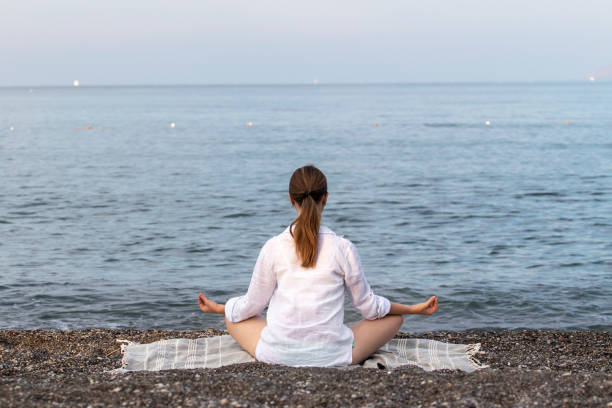 istock Yoga on the beach. 1345801286