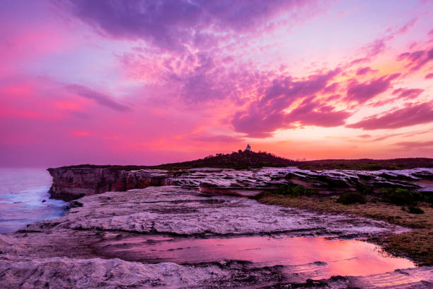 istock Amazing Sunset Sky top of Cape Baily Lighthouse 1345802533