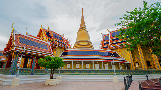 Beautiful landscape of Wat Ratchabophit Sathitmahasimaram Ratchaworawihan under blue sky and white cloud in Bangkok, Thailand. Thai Temple landmarks